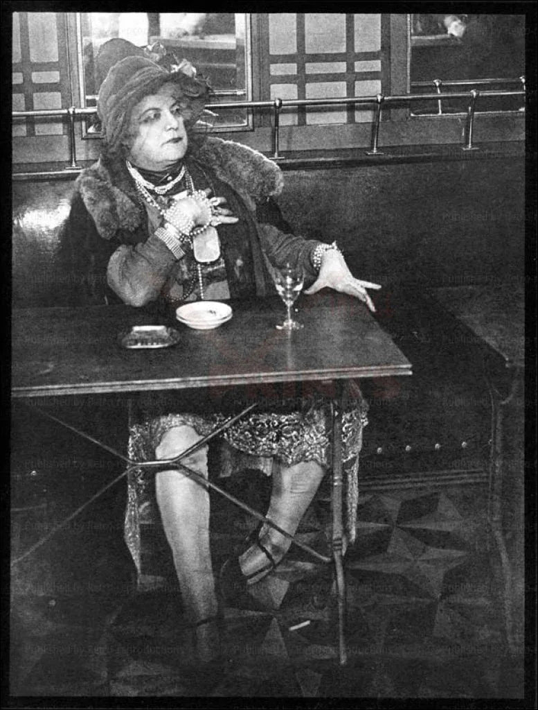 Woman Sitting at a Bar in Paris - VINTAGEARTREPRINTS.COM
