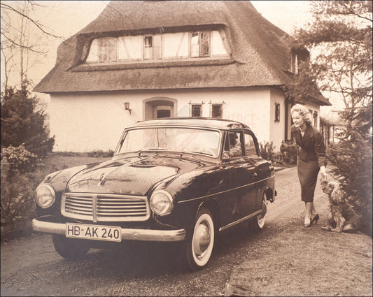 sepia tone image 1940's Goliath Atos car woman and dog